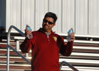 Matt giving out water