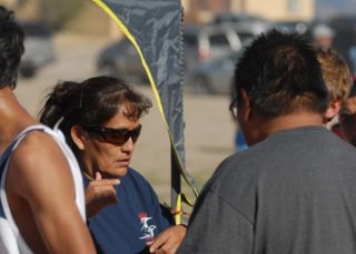 Cochiti Pueblo Community and SFIS supporters help out