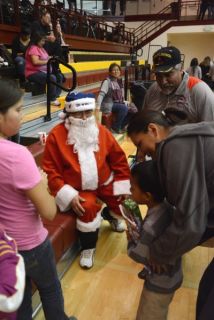 Santa giving out gifts