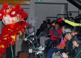 Lion Dancers and students